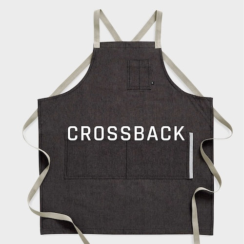 Reluctant Threads Crossback Aprons – comfortable and durable, for chefs, bakers, and hospitality staff. Pro quality & style.