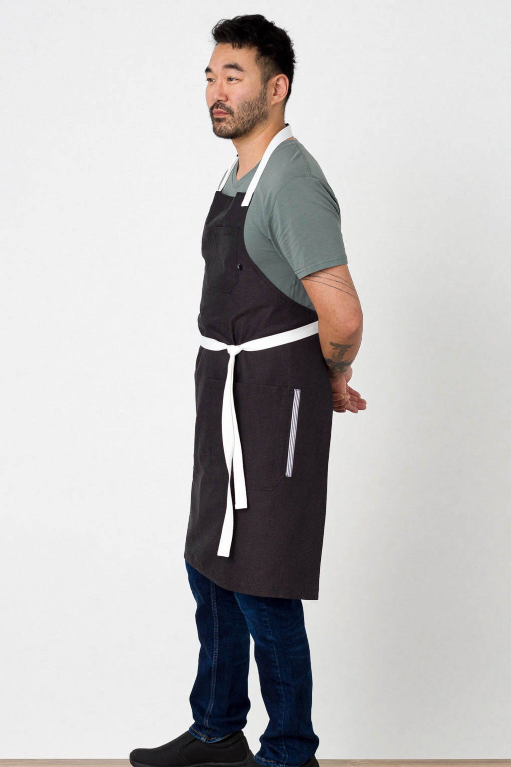 Classic Bib Chef Apron, Wrinkle Resistant Fabric, Black, Profile View, Industry Pricing, Quality