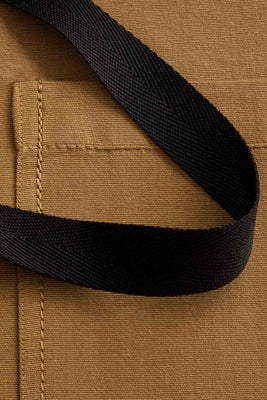 Ochre Canvas Apron Pocket Detail with Black Straps Reluctant Threads